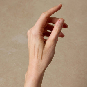 woman-shows-swatches-of-eyebrow-pencil-colors-on-her-hand