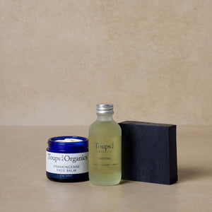 tallow-balm-calming-facial-tonic-and-activated-charcoal-tallow-soap-displayed-in-set