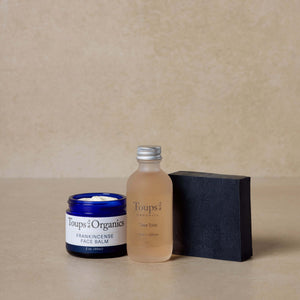 tallow-balm-clarifying-facial-tonic-and-activated-charcoal-tallow-soap-displayed-in-set