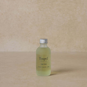 facial-tonic-for-redness-with-brown-background