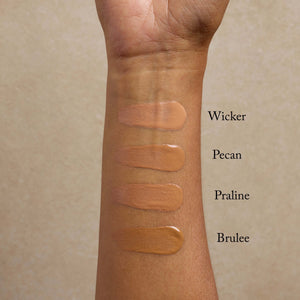 four-medium-shades-of-nontoxic-primer-swatched-on-a-womans-arm