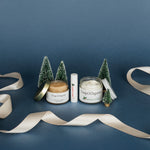 holiday-skincare-gift-set-displayed-with-christmas-decorations