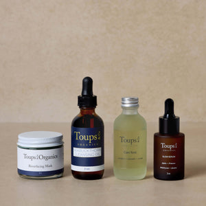 nontoxic-skincare-routine-set-with-calming-toner-displayed-on-brown-background