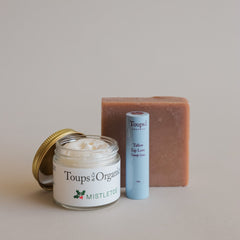 The Toups and Co Organics Merry and Bright Gift Set is a festive holiday bundle, perfect for natural skincare lovers who enjoy Christmas-inspired products.