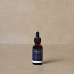 nontoxic-beard-oil-for-men-displayed-on-brown-background