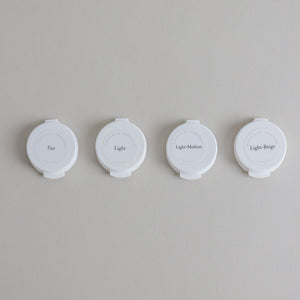 Toups & Co non-toxic mineral foundation samples in Fair, Light, Light-Medium, Light-Beige.