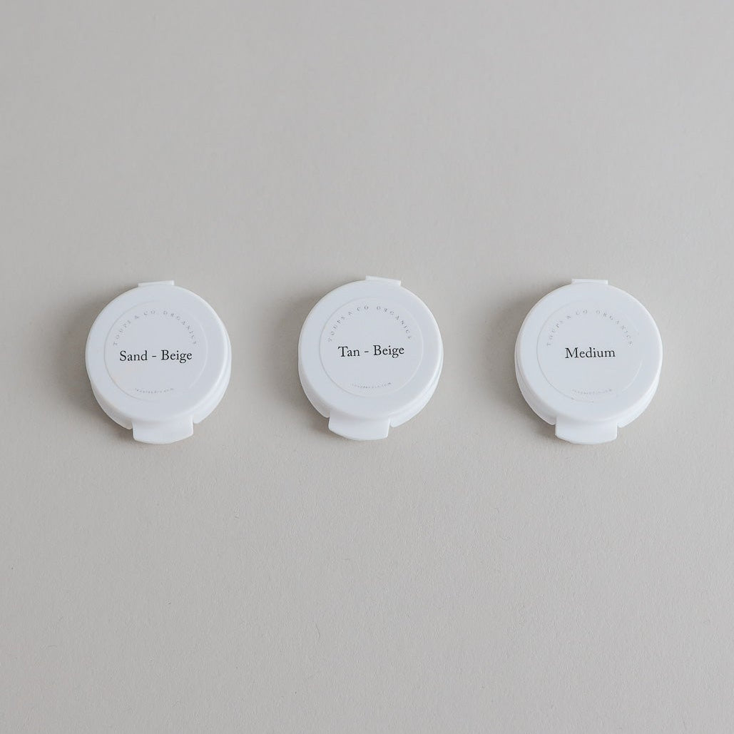 Toups & Co non-toxic mineral foundation samples in Sand-Beige, Tan-Beige, Medium.