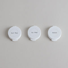 Toups & Co non-toxic mineral foundation samples in Sand-Beige, Tan-Beige, Medium.