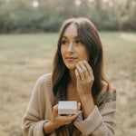 woman-applies-soap-to-her-face-with-facial-sea-sponge